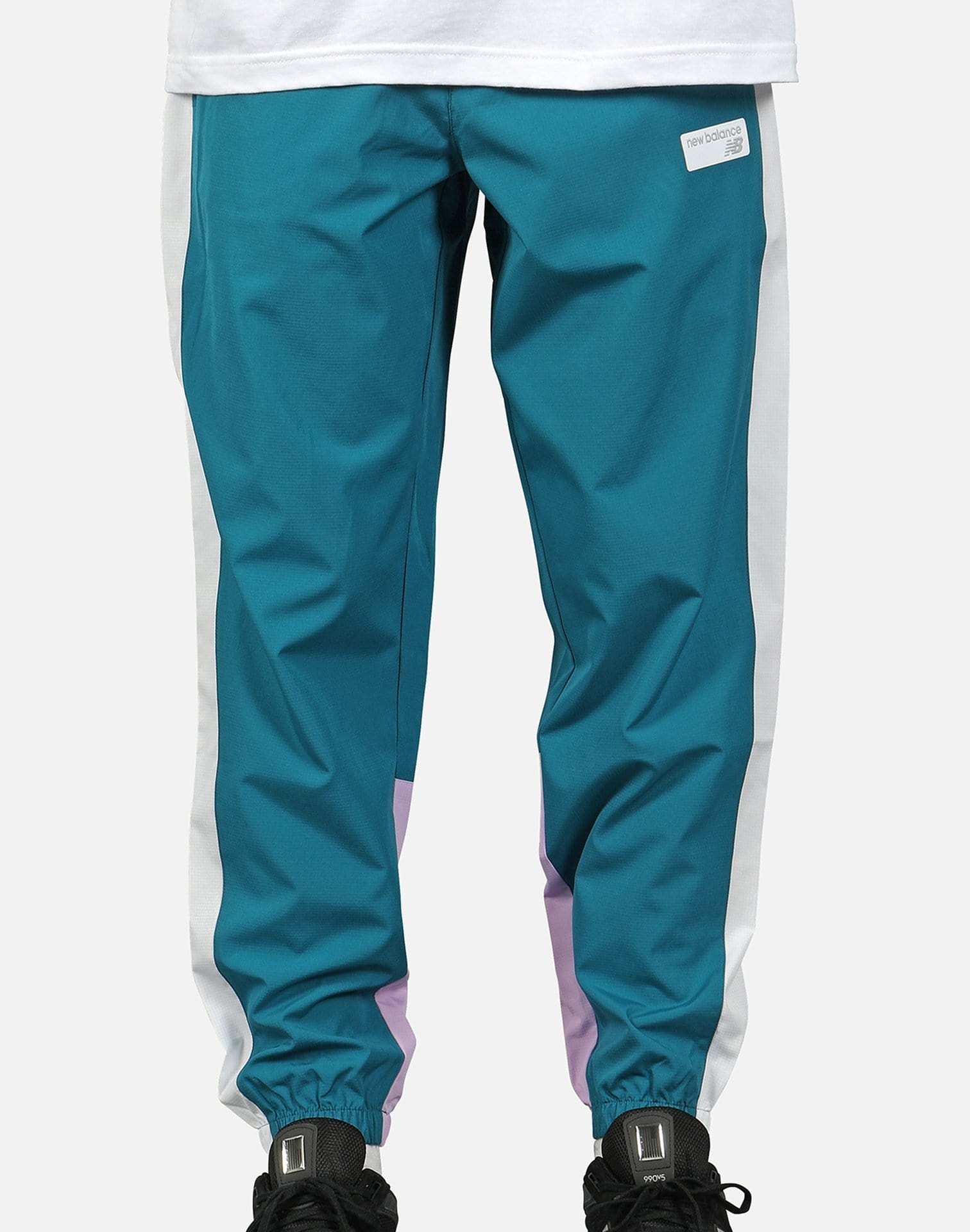 New Balance NB ATHLETICS WINDBREAKER PANTS New Balance NB ATHLETICS WINDBREAKER PANTS