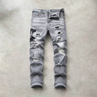 European Men’s Light Blue Ripped Embroidered Jeans Men’s Trendy Elastic Slim Fit American High Street Trousers European Men’s Light Blue Ripped Embroidered Jeans Men’s Trendy Elastic Slim Fit American High Street Trousers